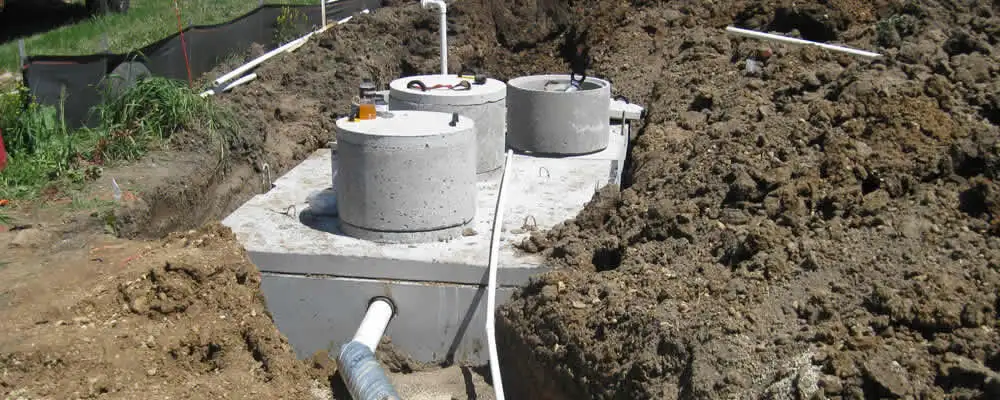 Septic system repair and installation site with tank access ports in Lynchburg, VA