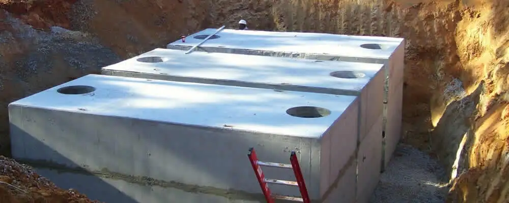 Septic tank installation site with a newly placed concrete tank in Lynchburg, VA